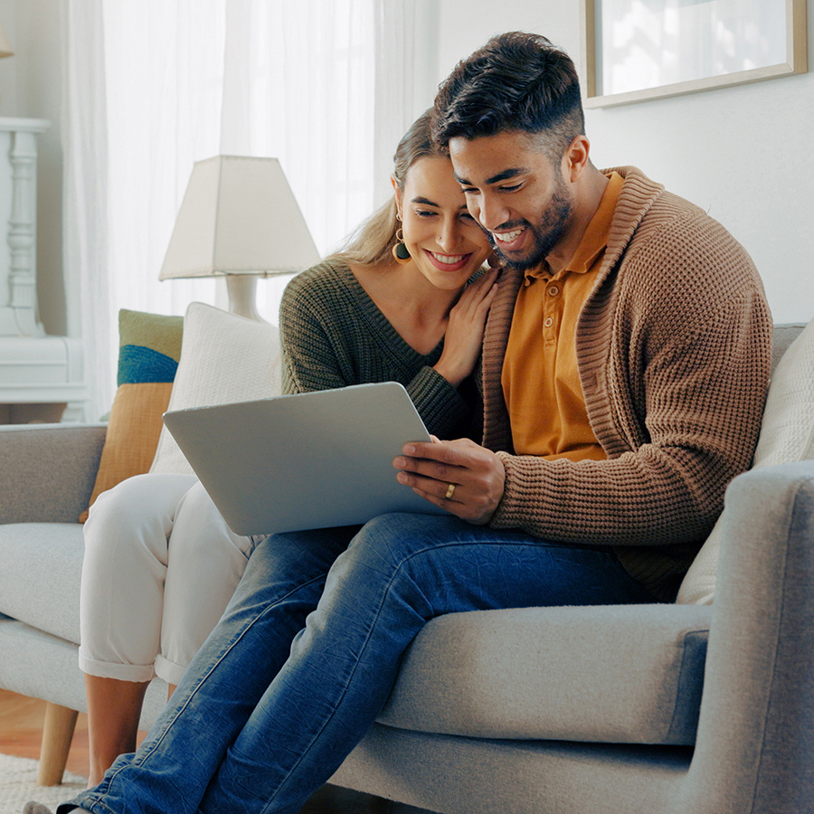 Couple looking at a tablet