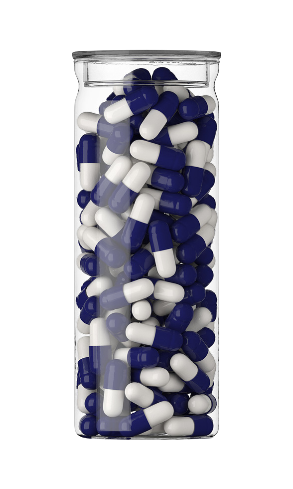 A clear vial filled with white and dark purple capsules.