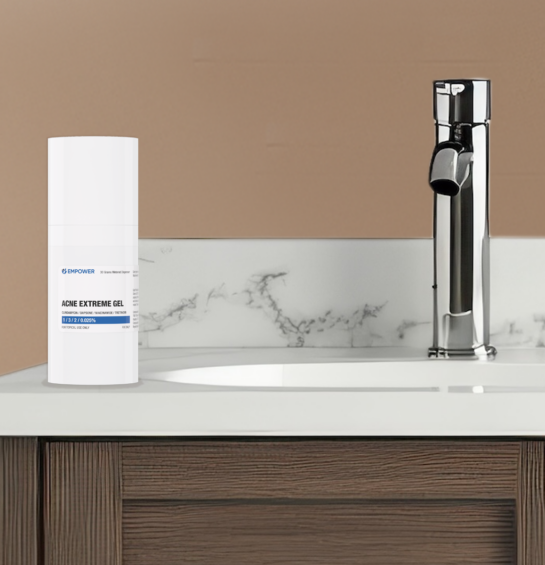 bathroom scene wit bottles of acne gel on counter