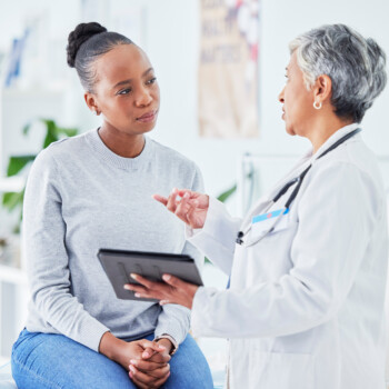 Woman and doctor talking
