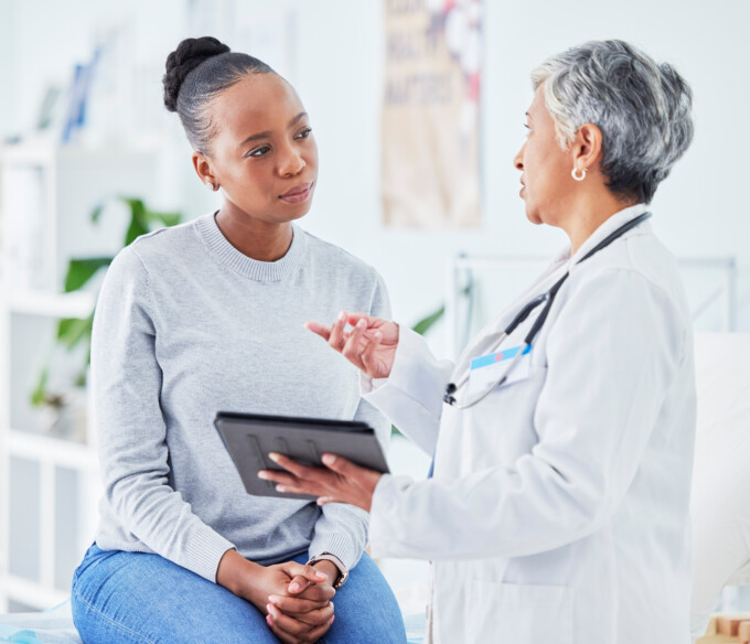 Woman and doctor talking