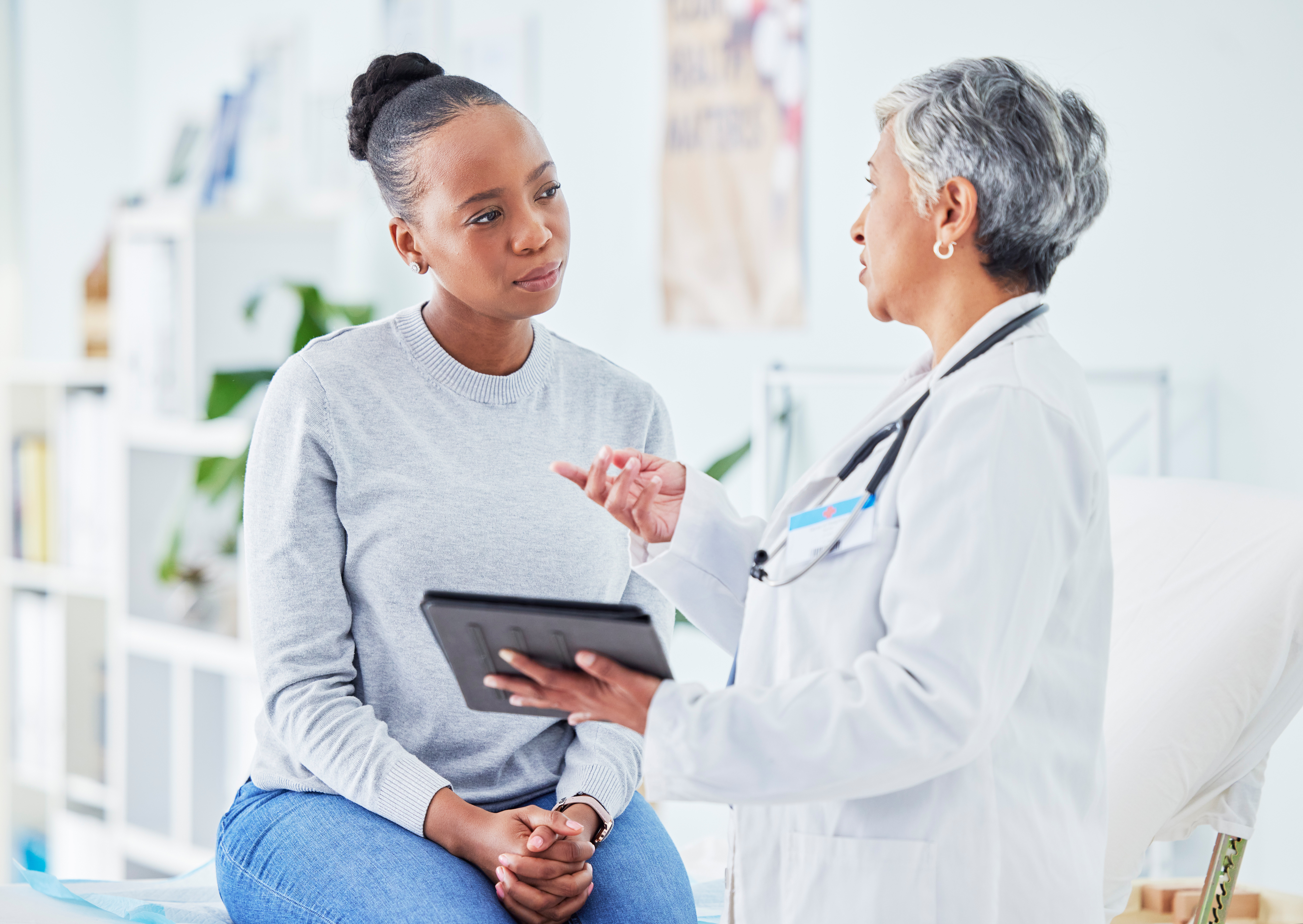 Woman and doctor talking